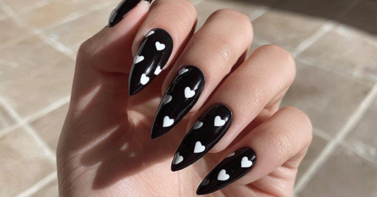 Learn how to create bold black tip nails with our step-by-step guide. Explore trendy designs and tips at NailsXDesigns
