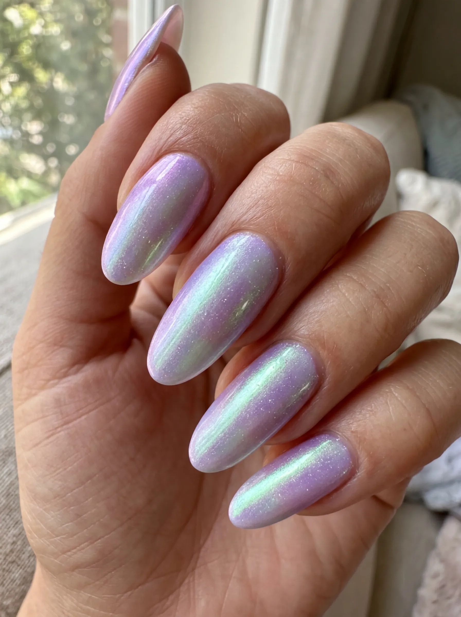 Bio-chromatic iridescence as part of the best 5 nails design for 2026