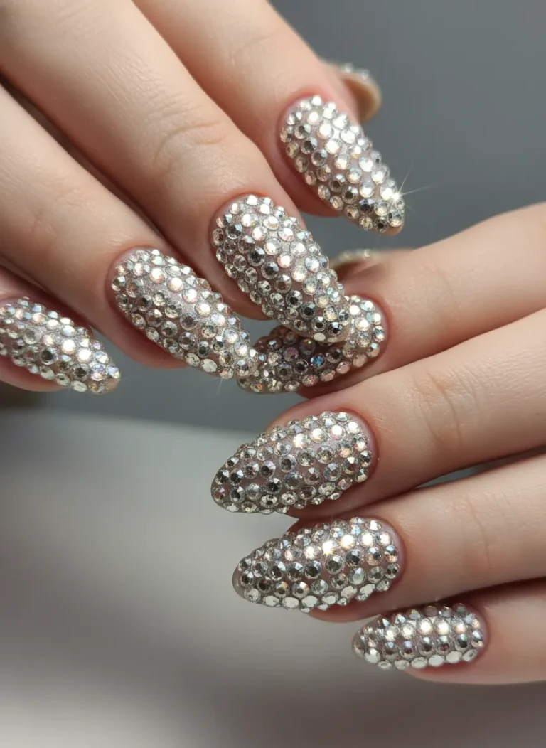 High-quality professional rhinestone nails reflecting soft studio light